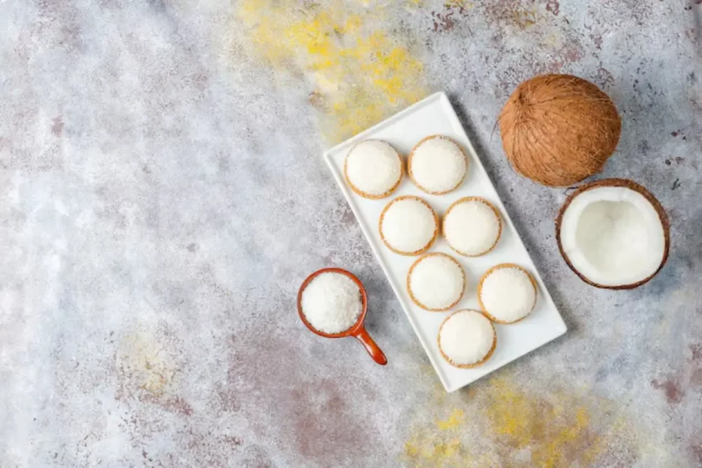 Coconut marshmallow cookies with half coconut,top view