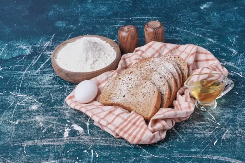 Bread made from all purpose flour on blue table.